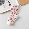 Beige cotton blend crew socks with pink and blue leopard pattern in a flat lay view - Size 35-42 / White Pink Lips