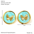Detail of round butterfly earrings in 18k gold plated steel with turquoise enamel - Light Blue Round Butterfly Relief Style (SE831G)