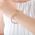 Silver cable cuff bracelet with gold accents and light blue zircon stones - Z235-Blue Zirconia Double Layer