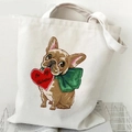 Cream French Bulldog canvas tote bag with a cute 'Be My Valentine' print on a grid rack - Valentine's Bulldog (M)