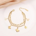 Double-layer gold butterfly bracelet in titanium steel with hollow and solid pendants - Gold