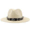 Detail of beige fedora straw hat with black leather band and silver skull metal stud - Beige
