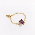 Macro view of adjustable gold chain ring with square purple zircon and heart charm - Purple Zircon - Gold