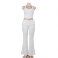 Detail shot of the white textured knit fabric on the sleeveless top and trousers set - S / White