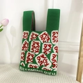 Green knitted handbag with red character pattern and Becoming Rich slogan detail - Rich-Green