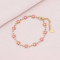 Detail of gold chain bracelet featuring pink enamel daisies and adjustable lobster clasp - Pink (Gold)