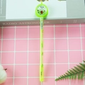 Groene esthetische gelpen met avocado-ontwerp en transparante schudkap op roze - Avocadogroen
