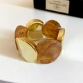 Detail of amber marble resin and gold metal blocks on a wide elastic bracelet - Gold-Light Coffee
