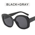Gafas de sol ovaladas de gran tamaño con montura negra brillante y cristales gris oscuro - Montura negra brillante, lentes grises completas - patilla negra