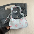 Light blue floral canvas baguette bag with pink rose print and ruffled handle - Blue
