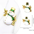 Golden snowman napkin ring with colorful enamel finish and detailed winter holiday design - Snowman Style 33