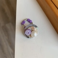 Macro shot of retro beaded ring with purple acrylic beads and iridescent shell charm - Style J Taro Purple
