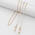 Chic eyewear chain featuring elegant white faux pearls on a delicate gold alloy link - 70cm / Handmade Pearl Chain
