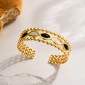 Gold stainless steel open cuff bracelet with black and pearl white enamel inlays - Gold B&W Oval