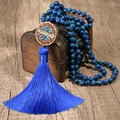 Detail of Tibetan necklace with blue beads and handcrafted pendant with sky blue tassel - Ethnic Long Tassel / Blue