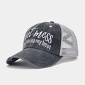 Close-up of gray washed ponytail baseball cap with distressed mesh and slogan embroidery - Adjustable / Grey Hot Mess Slogan