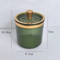 Green ribbed glass storage jar with gold lid and dimensions 10.8cm by 9cm - Metal Conical Handle / Light Green