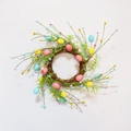 Close-up of Easter egg wreath with rattan base, pastel berries and green fern leaves - 30cm Easter Egg Natural Vine Ring Wreath