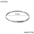 Polished silver stainless steel open bangle bracelet with measurements and size detail - Inner Diameter 5.7cm Width 0.5cm / Silver (Facetted)