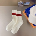 White combed cotton crew socks with red double stripes in a cozy lifestyle setting - One Size / White with Red Stripes