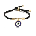 Adjustable black woven rope bracelet with gold-plated blue enamel evil eye charm - Black