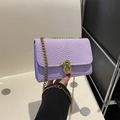 Chic purple embossed nylon chain shoulder bag with stylish gold circular metal lock buckle - Purple