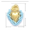 Macro detail of heart pendant with blue beads and gold stainless steel material specs - Sky Blue Beaded Flame Heart