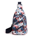 Women's nylon crossbody bag featuring vibrant floral leaf patterns and multi-zipper pockets - Ginkgo