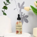 Gomphrena globosa multi-use essential oil in a glass dropper bottle with real flowers - Gomphrena Globosa Multi-use Oil