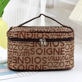 Brown fabric cosmetic bag with SOIGNE print and top handle for travel organization - Coffee