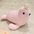 Soft pink sea lion plush toy with decorative ball on fuzzy white carpet background - Pink Seal Lion / 25cm