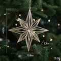 Décoration de sapin de Noël en forme d'étoile dorée à huit branches avec lumières bokeh - Étoile à Huit Branches