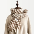 Brown and white houndstooth scarf with tassels on mannequin with beige coat - Brown Style (Style 3)