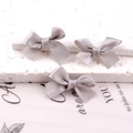 Mini light grey satin ribbon bow hair clip with a smooth glossy silk finish - Gray