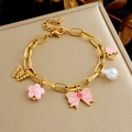 Pink bow and flower charms on gold-plated stainless steel bracelet with pearls - Pink Bow Flower Artificial Pearl Bracelet (B1511)