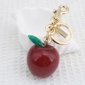 Portachiavi a forma di mela rossa glitterata con foglia verde e gancio in metallo dorato - Mela rossa grande con foglia in resina verde (Oro pallido)