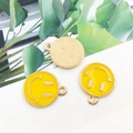 Three yellow enamel smiley face pendants with gold borders and textured metallic back - Small 12x14mm / Yellow