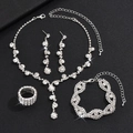 Sparkling crystal rhinestone necklace earrings bracelet and ring silver jewelry set for brides - 869 4-Piece Set