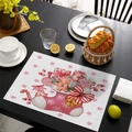 Pink Christmas placemat with gingerbread man and stockings on black wooden table - CD57-26