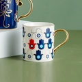 White ceramic Hamsa mug with gold handle and colorful patterns for coffee and milk - Blue Colorful Hamsa Hand Style (CF0156)