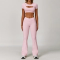 Two-piece light pink yoga set with cut-out short sleeve top and flare leggings - XL / Top And Bottom / Short Sleeve + Flare Pants / Peach Pink