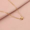 Detail shot of a golden starfish pendant necklace lying on soft pink aesthetic fabric - 18K Gold Plated 5#