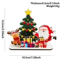 Size specifications of wooden Santa Claus tabletop decoration with dimensions and weight - Elk