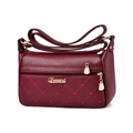 Quilted burgundy leather shoulder bag with heart embroidery and golden hardware - Burgundy