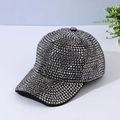 Close-up detail of a shimmering rhinestone baseball cap with dense dark silver crystals - Adjustable / Gun Black