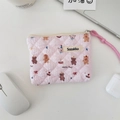 Detailed close-up of pink quilted cotton makeup bag with cute bear and floral patterns - Happy Bear