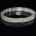 Macro shot of double-row rhinestone stretch bridal bracelet on black reflective background - 2 Row Silver Clear Rhinestone Bracelet