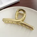 Polished gold metal shark hair claw clip in 11cm large size with minimalist mirror finish - KC Gold