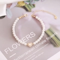 Elegant 18K gold heart charm pearl bracelet with sparkling zircon stones for women - White