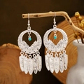 Ethnic style long silver tassel earrings with turquoise beads hanging on a rustic wood branch - Large Ring Artificial Turquoise Tassel Style (E2871-25)